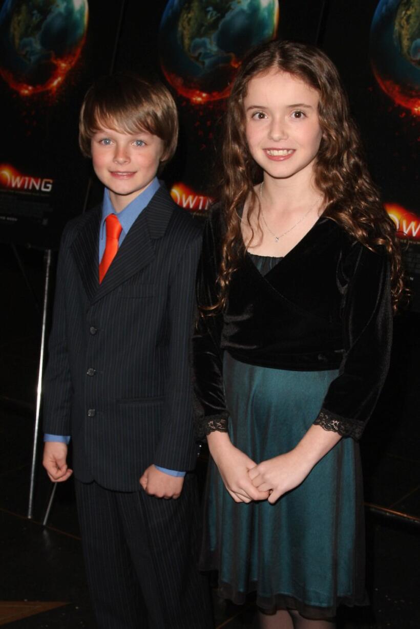 Chandler Canterbury and Lara Robinson at the premiere of "Knowing."