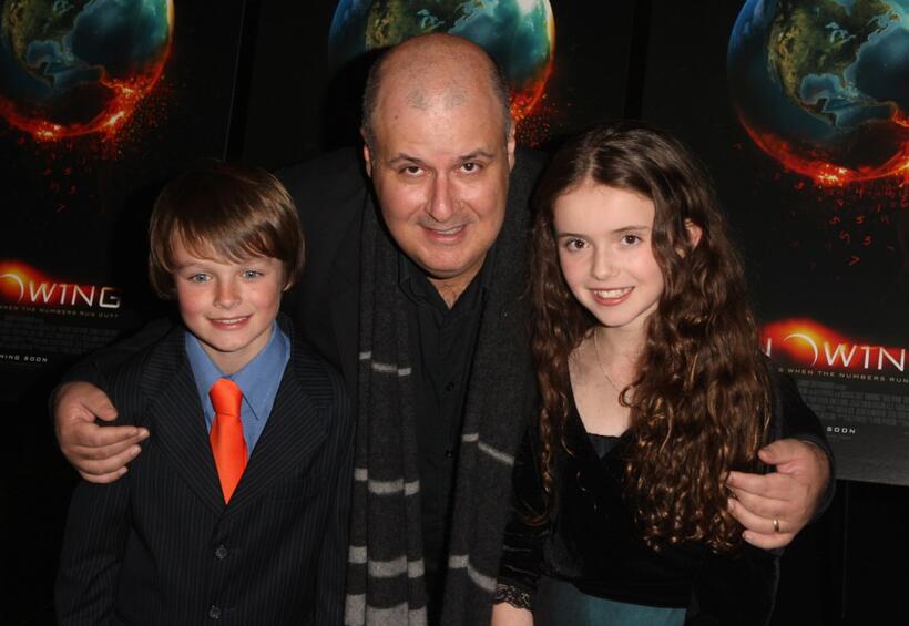 Chandler Canterbury, Director Alex Proyas and Lara Robinson at the premiere of "Knowing."