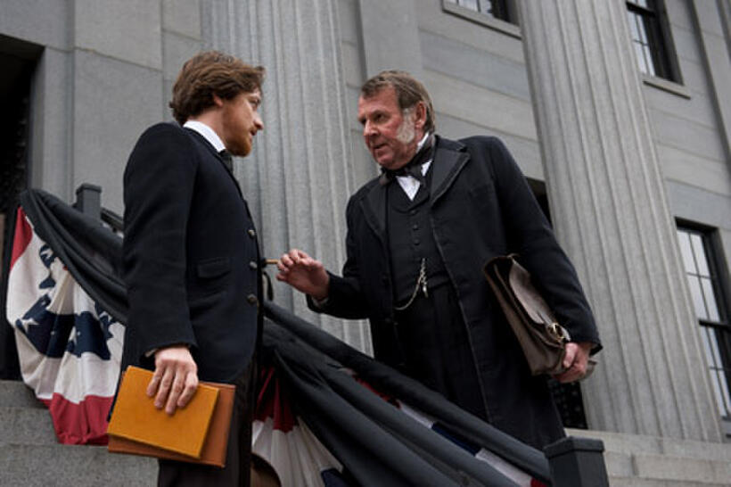 James McAvoy as Frederick Aiken and Tom Wilkinson as Reverdy Johnson in ``The Conspirator.''