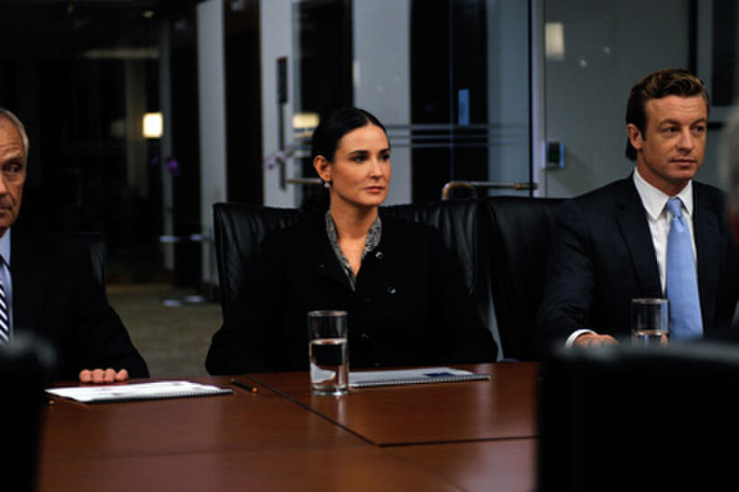 Demi Moore as Sarah Robertson and Simon Baker as Jared Cohen in ``Margin Call.''