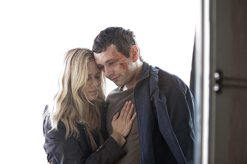 Maria Bello as Kate Carroll and Michael Sheen as Bill Carroll in ``Beautiful Boy.''