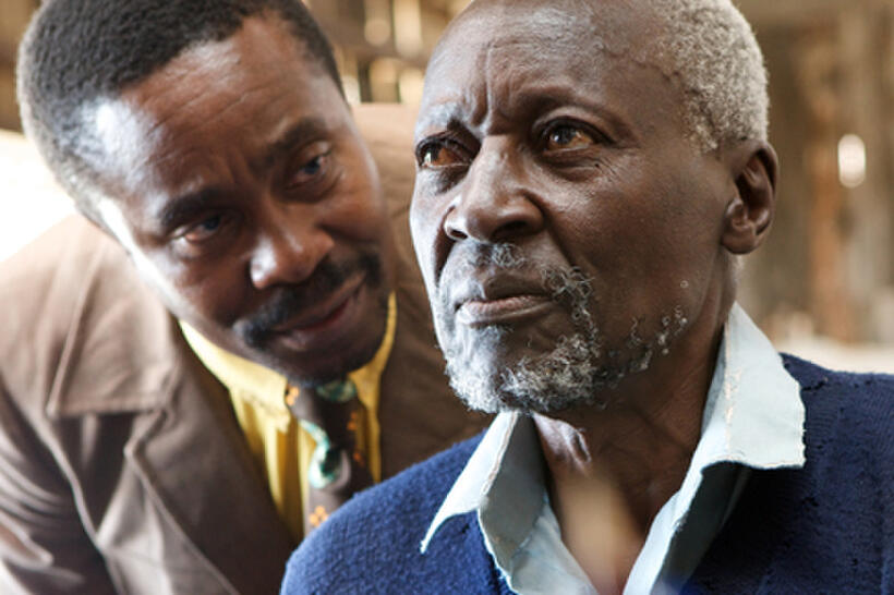 Vusi Kunene as Mr. Kipruto and Oliver Litondo as Kimani N'gan'ga Maruge in ``The First Grader.''