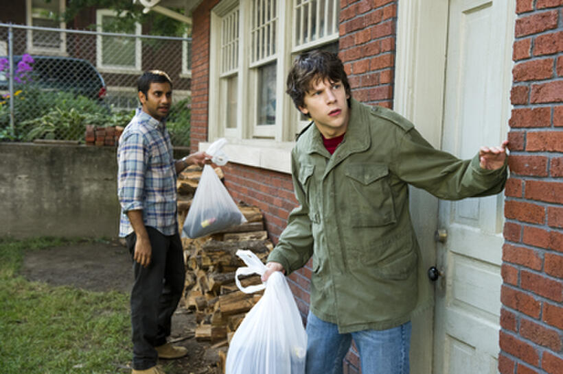 Aziz Ansari as Chet and Jesse Eisenberg as Nick in ``30 Minutes or Less.''