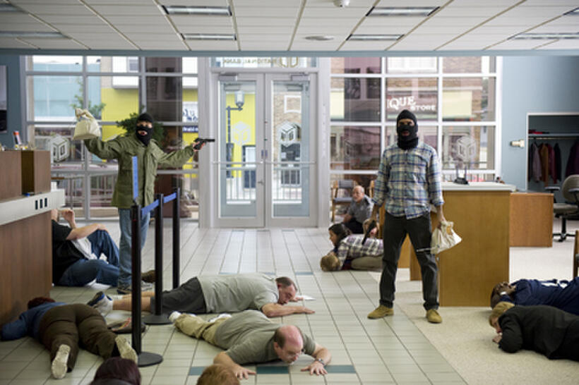 Jesse Eisenberg as Nick and Aziz Ansar as Chet in ``30 Minutes or Less.''