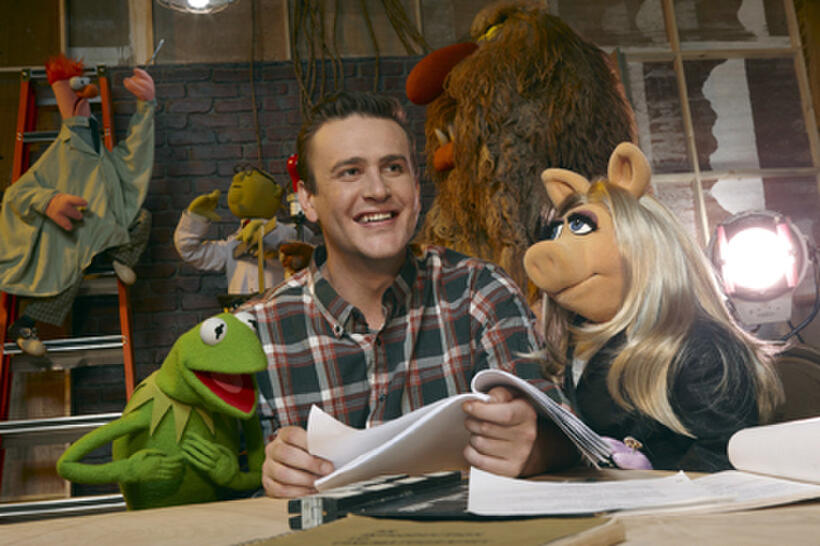 Kermit the Frog, Jason Segel and Miss Piggy in ``The Muppets.''