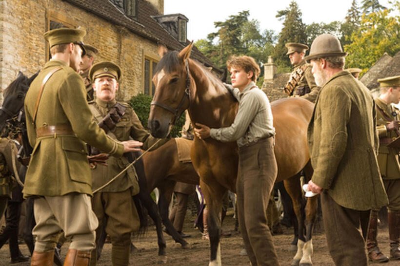 Tom Hiddleston as Captain Nicholls, Geoff Bell as Sergeant Perkins, Joey, Jeremy Irvine as Albert and Peter Mullan as Ted Narracott in ``War Horse.''