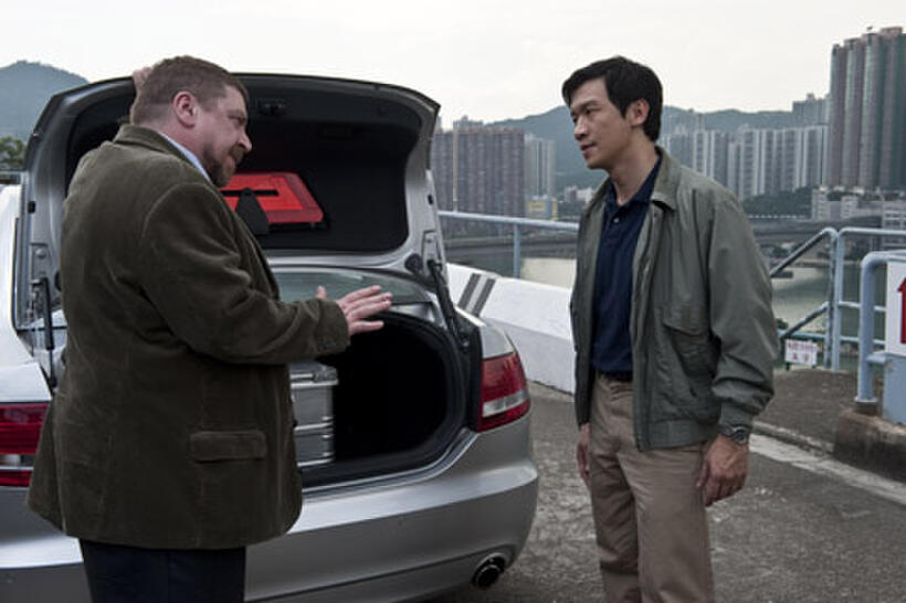 Armin Rohde as Damian Leopold and Chin Han as Sun Feng in ``Contagion.''