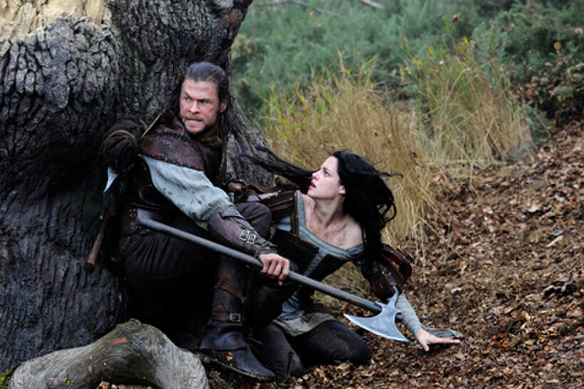 Chris Hemsworth as The Huntsman and Kristen Stewart as Snow White in ``Snow White & the Huntsman.''