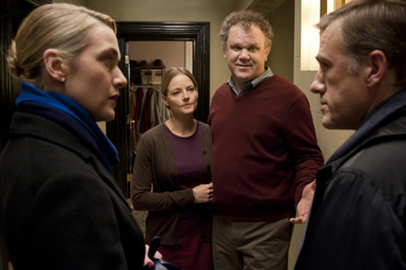 Kate Winslet as Nancy Cowan, Jodie Foster as Penelope Longstreet, John C. Reilly as Michael Longstreet and Christoph Waltz as Alan Cowan in "Carnage.''