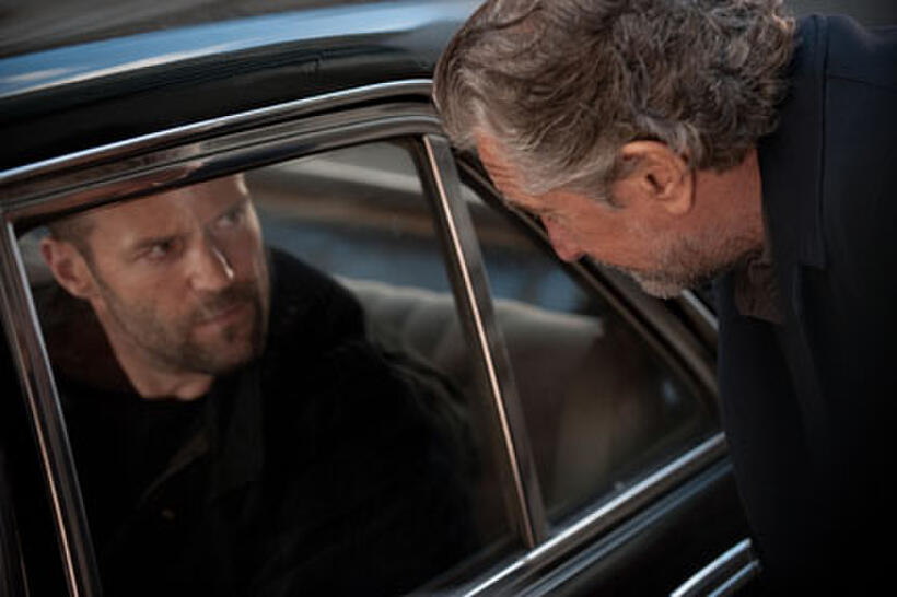 Jason Statham as Danny Bryce and Robert De Niro as Hunter in ``Killer Elite.''