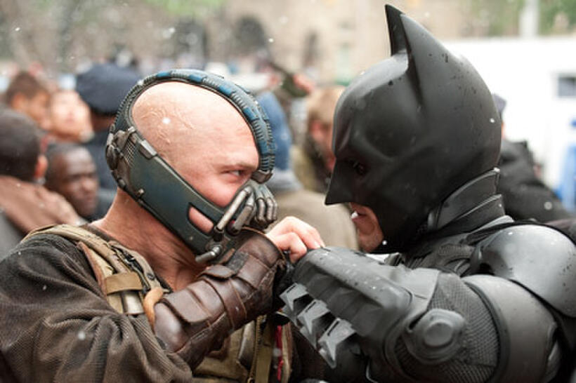 Tom Hardy as Bane and Christian Bale as Batman in ``The Dark Knight Rises.''