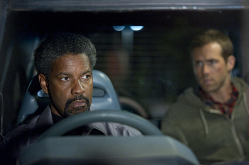 Denzel Washington as Tobin Frost and Ryan Reynolds as Matt Weston in "Safe House.''