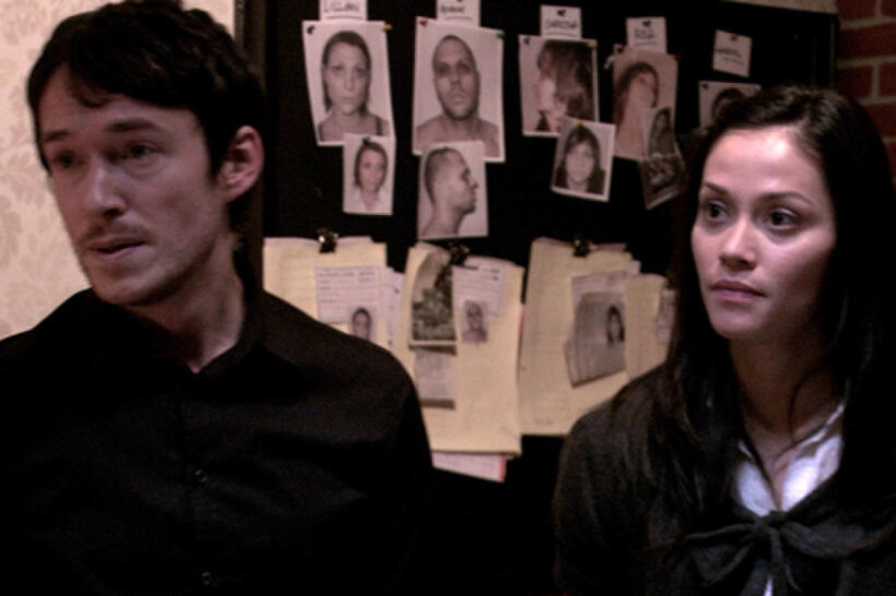 Simon Quarterman as Fr. Ben Rawlings and Fernanda Andrade as Isabella Rossi in ``The Devil Inside.''