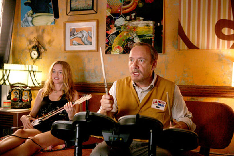 Heather Graham as Phoebe and Kevin Spacey as Robert Axle in ``Father of Invention.''