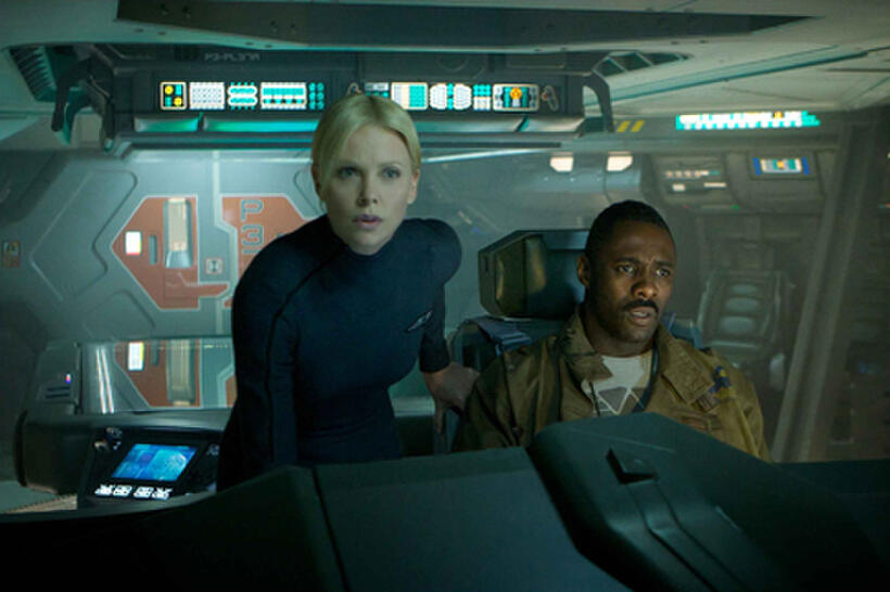 Charlize Theron as Meredith Vickers and Idris Elba as Captain Janek in "Prometheus.''