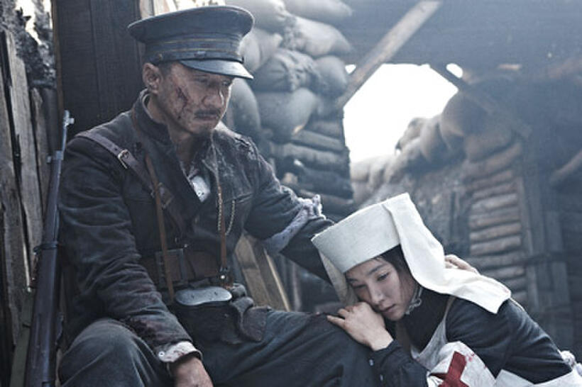 Jackie Chan as Huang Xing and Bingbing Li as Xu Zonghan in ``1911.''