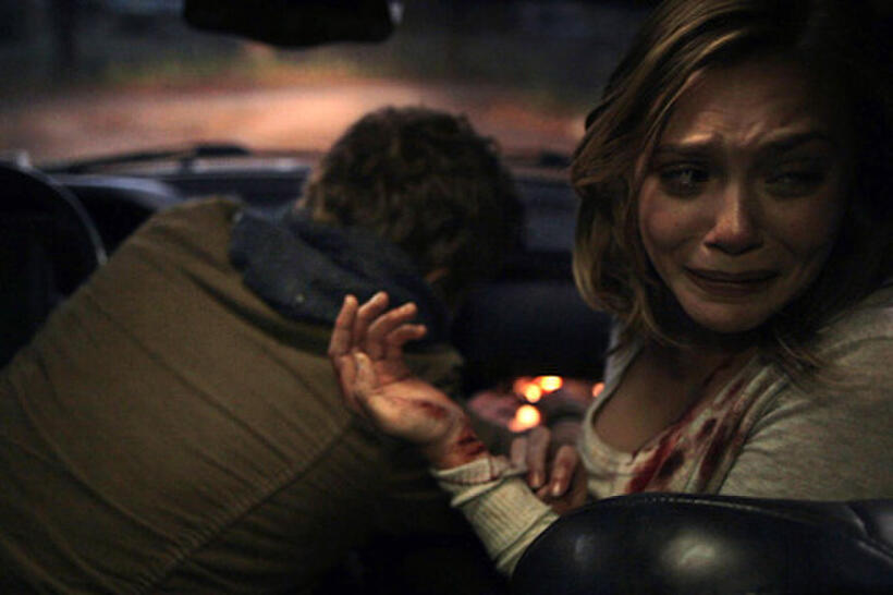 Eric Sheffer Stevens as Peter and Elizabeth Olsen as Sarah in ``Silent House.''