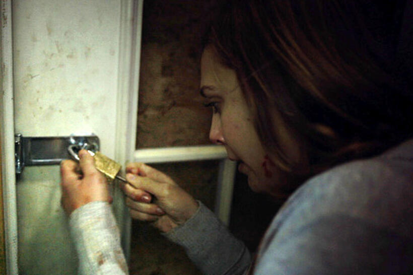Elizabeth Olsen as Sarah in ``Silent House.''