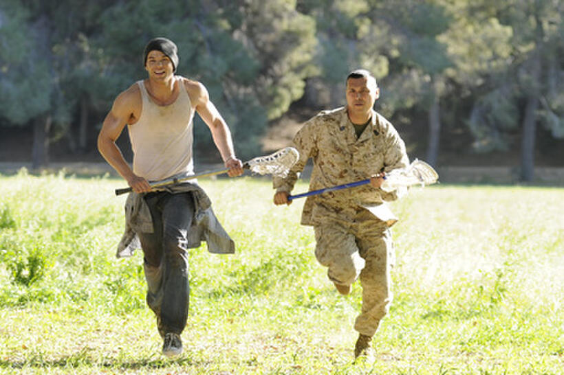 Kellan Lutz as Conor Sullivan and Adam Beach as Sgt. Major Duke Wayne in ``A Warrior's Heart.''