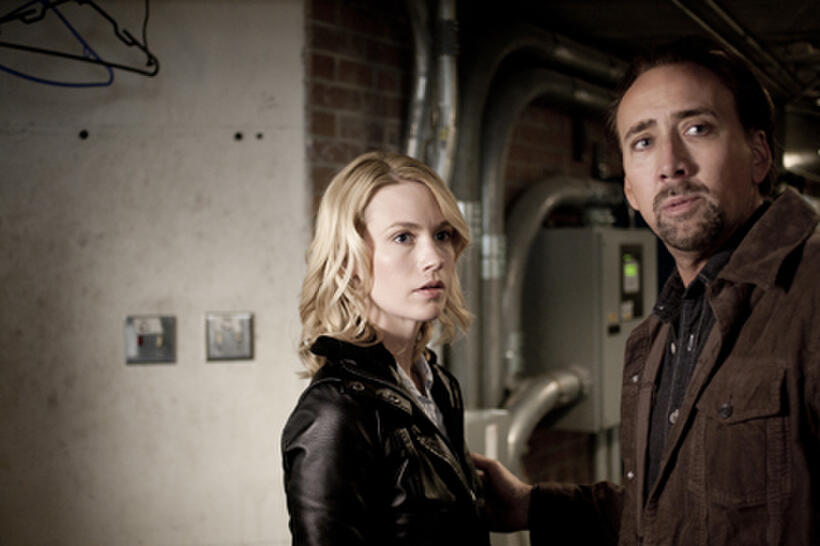 January Jones as Laura Gerard and Nicolas Cage as Will Gerard in ``Seeking Justice.''