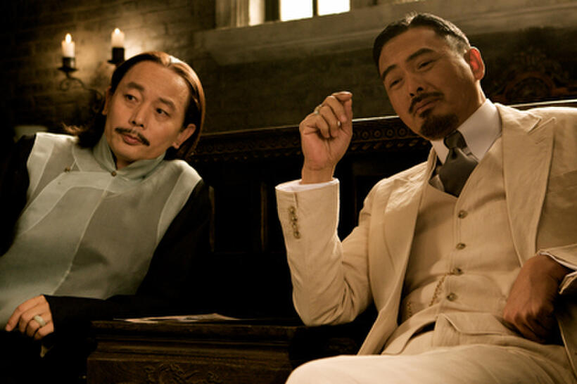 You Ge as Ma Bangde and Yun-Fat Chow as Master Huang in ``Let the Bullets Fly.''