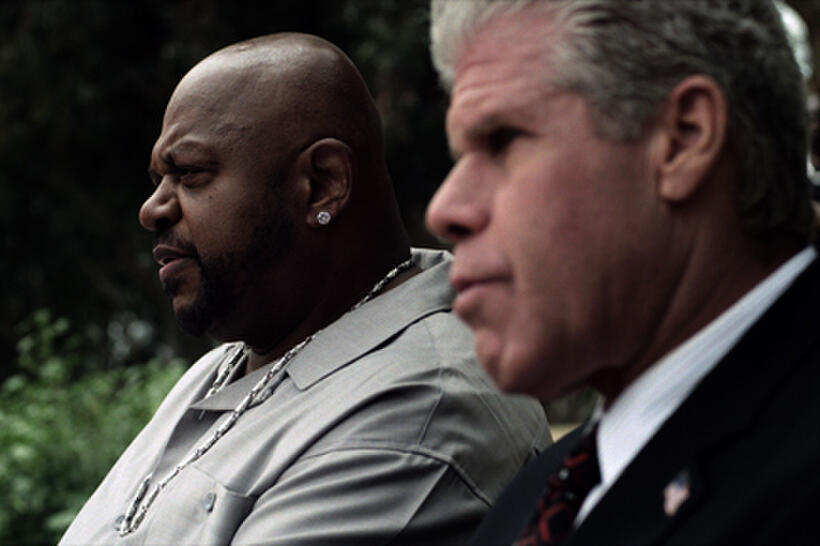 Charles S. Dutton as Panther and Ron Perlman as Mayor Williams in ``Bad Ass.''
