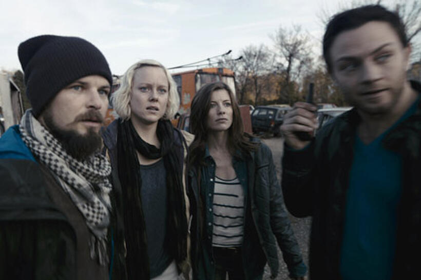 Nathan Phillips as Michael, Ingrid Bolso Berdal as Zoe, Devin Kelley as Amanda and Jonathan Sadowski as Paul in ``Chernobyl Diaries.''