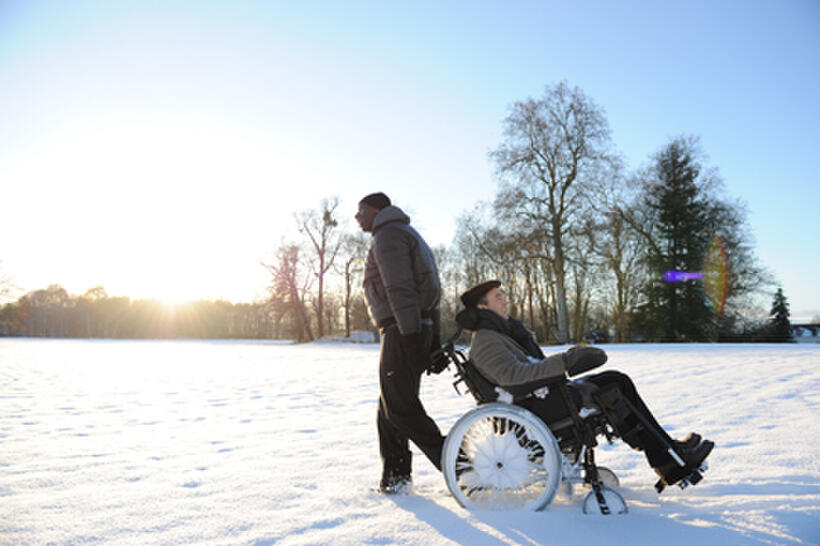Omar Sy as Driss and Francois Cluzet as Philippe in ``The Intouchables.''