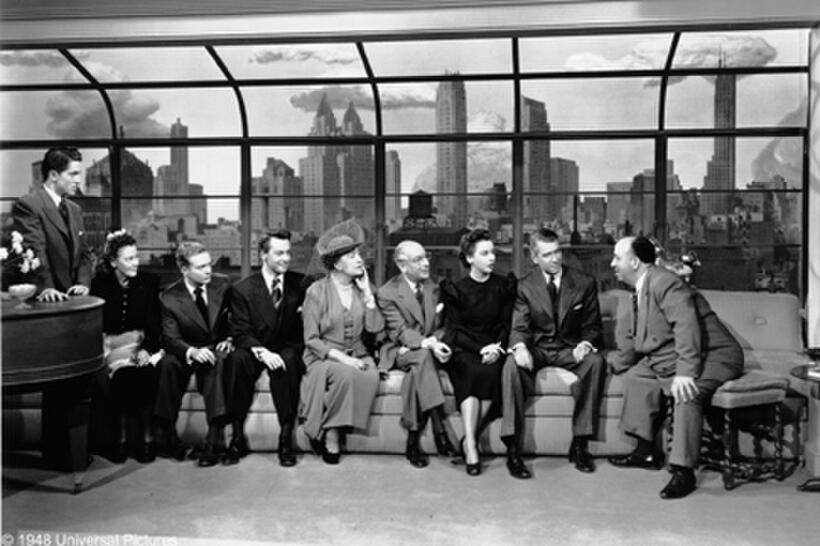 Farley Granger, Edith Evanson, Douglas Dick, John Dall, Constance Collier, Sir Cedric Hardwicke, Joan Chandler, James Stewart, and Alfred Hitchcock.