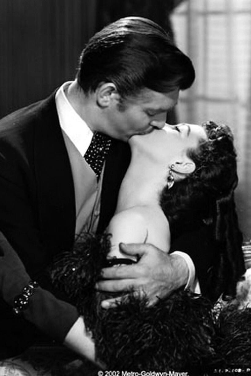 Clark Gable as Rhett Butler and Vivien Leigh as Scarlett O'Hara in ``Gone with the Wind.''