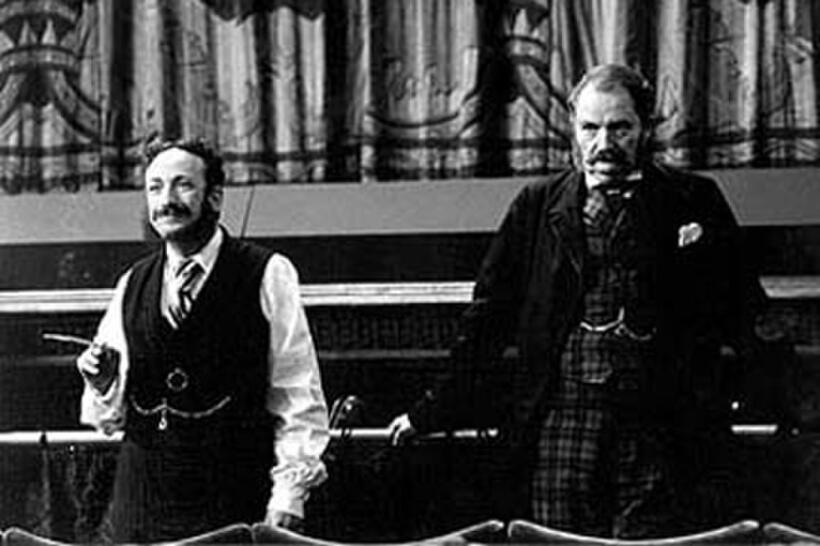 Allan Corduner as Sir Arthur Sullivan and Jim Broadbent's as W.S. Gilbert in "Topsy-Turvy."