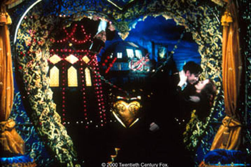 Ewan McGregor and Nicole Kidman star in director Baz Luhrmann's MOULIN ROUGE, a celebration of love and creative inspiration set in the Persian nightclub.
