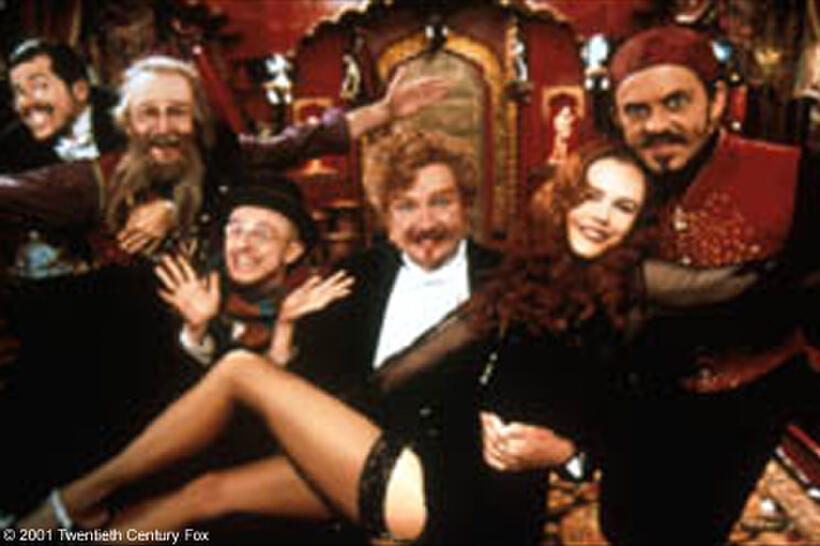 John Leguizamo (as Toulouse-Lautrec), Garry McDonald, Matthew Whittet, Jim Broadbent, Nicole Kidman and Jacek Koman in a scene from Moulin Rouge.