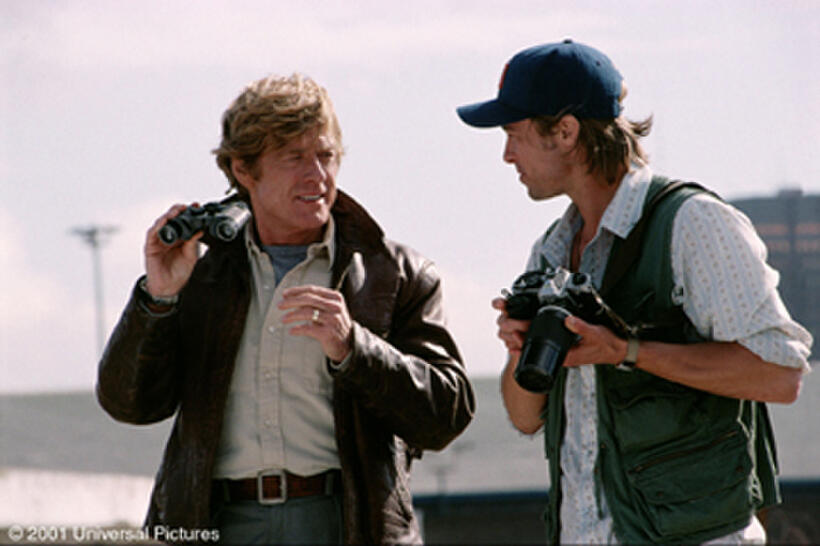 CIA operative Nathan Muir (Robert Redford) has taught his protege Tom Bishop (Brad Pitt) everything he knows about international espionage in "Spy Game."