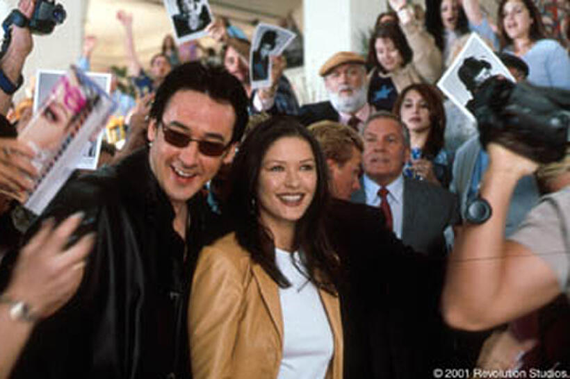 John Cusack and Catherine Zeta-Jones star in the Revolution Studios/Columbia Pictures romantic comedy AMERICA'S SWEETHEARTS.