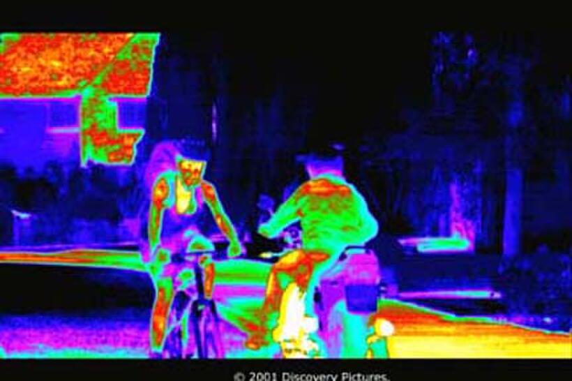 Thermal image of a bike rider and a motorcyclist in "The Human Body."