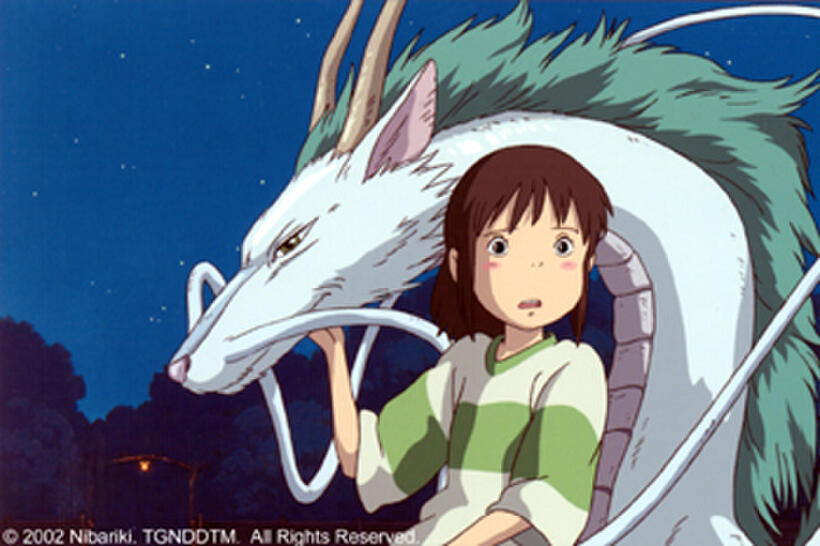 Chihiro meets Haku, a mysterious youth who can turn into a dragon to serve the sorceress Yubaba.