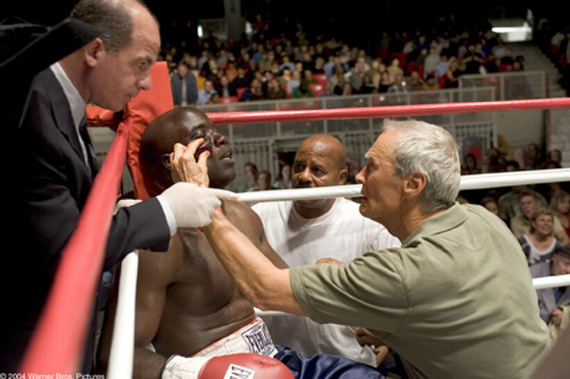 CLINT EASTWOOD as Frankie and MIKE COLTER as Big Willie in Warner Bros. Pictures' drama "Million Dollar Baby." The Malpaso production also stars Hilary Swank and Morgan Freeman.