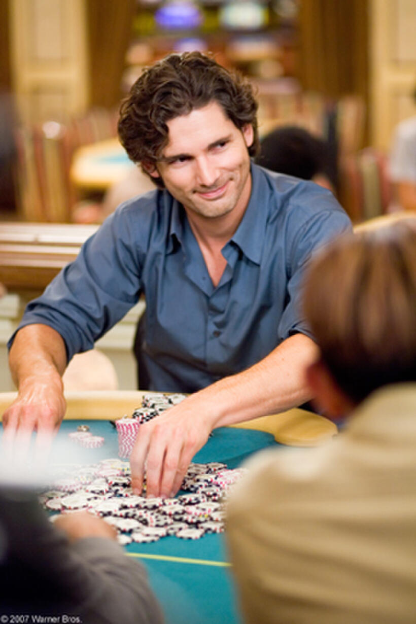 Huck Cheever (Eric Bana) rakes in a pot at the poker table in "Lucky You."