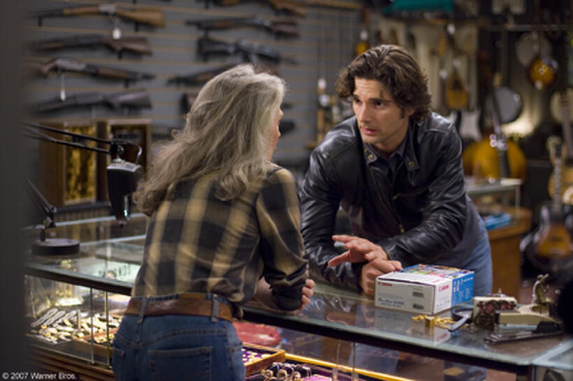 Huck Cheever (Eric Bana) negotiates with a pawnshop owner (Phyllis Sommerville) in "Lucky You."