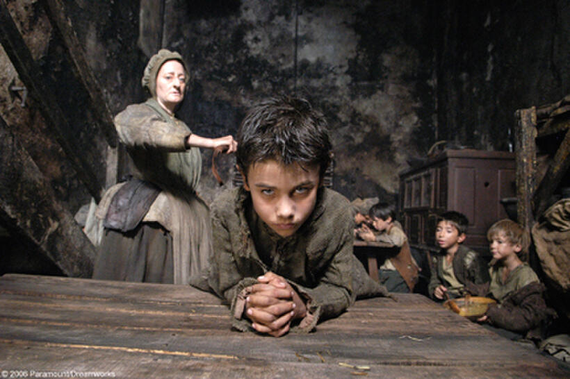 The orphaned 5-year-old Jean-Baptiste Grenouille (Alvaro Roque) receives discipline from Madame Gaillard (Sian Thomas) in "Perfume: The Story of a Murderer."