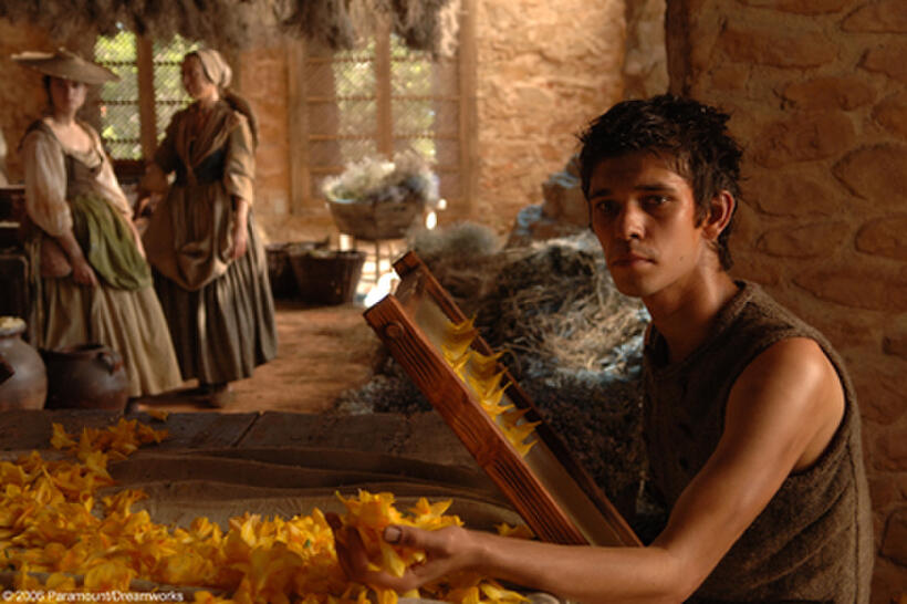 Perfumer Jean-Baptiste Grenouille (Ben Whishaw) at work in the enflourage market in "Perfume: The Story of a Murderer."