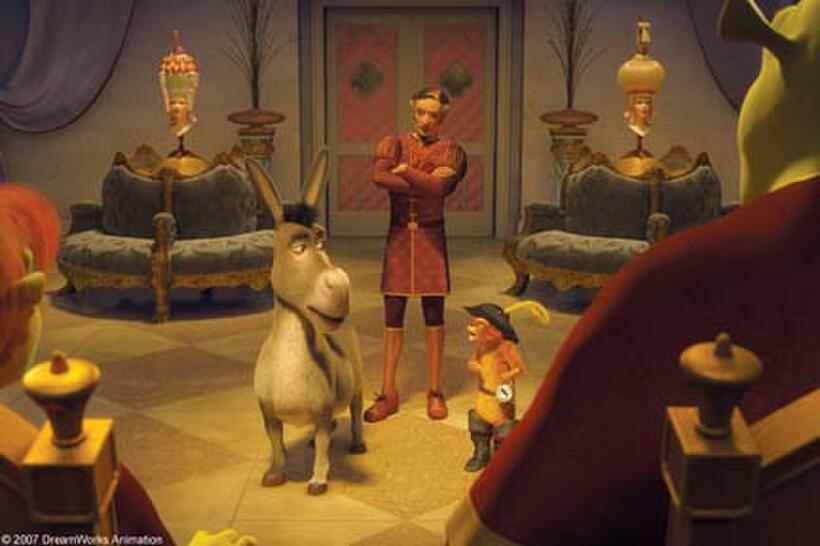 Shrek (Mike Myers), Fiona (Cameron Diaz), the stylist Raoul (Guillaume Aretos), Donkey (Eddie Murphy) and Puss In Boots (Antonio Banderas) in "Shrek the Third."