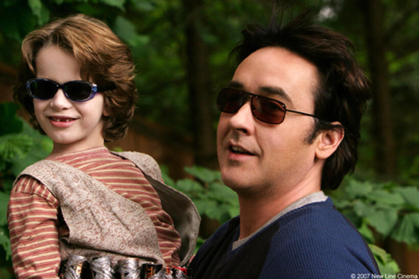 Bobby Coleman and John Cusack in "Martian Child."