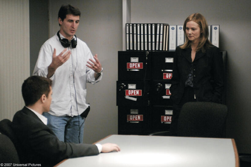 Ryan Phillippe, director Billy Ray and Laura Linney on the set of "Breach."