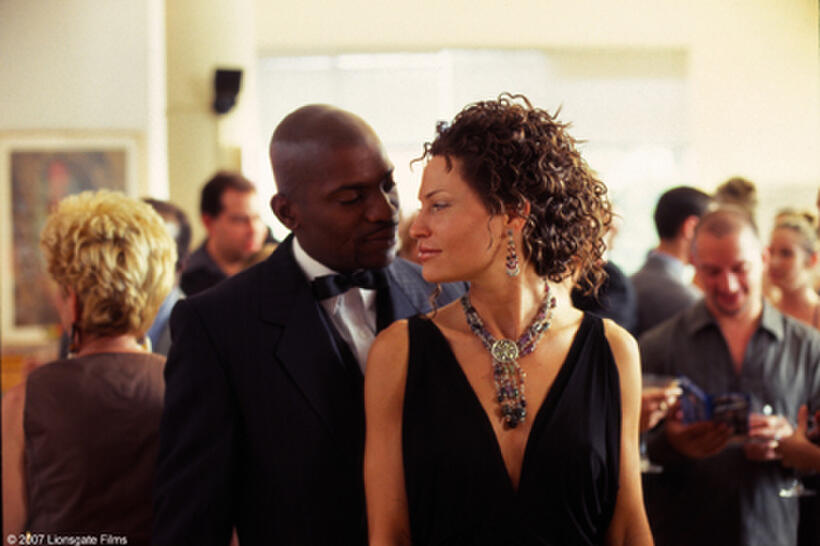 Isaac Duparde (Mekhi Phifer) and Nora Timmer (Jolene Blalock) in "Slow Burn."