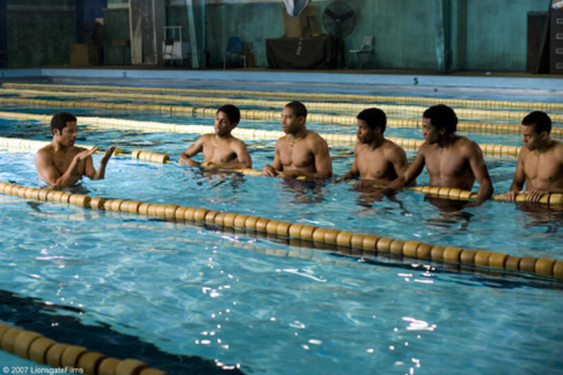 Jim Ellis (Terrence Howard) demonstrates swimming techniques for his team in "Pride."