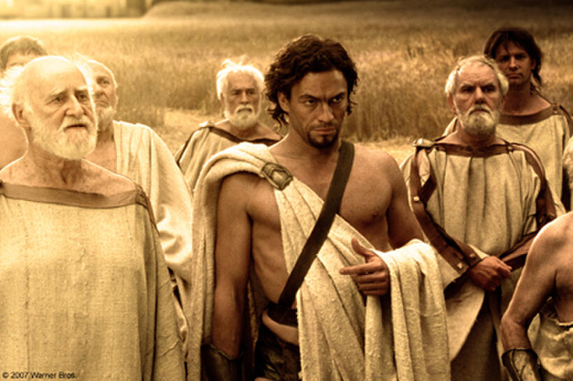 Theron (Dominic West) and a group of Councilmen watch as King Leonidas prepares his men for a march to Thermopylae in "300." 