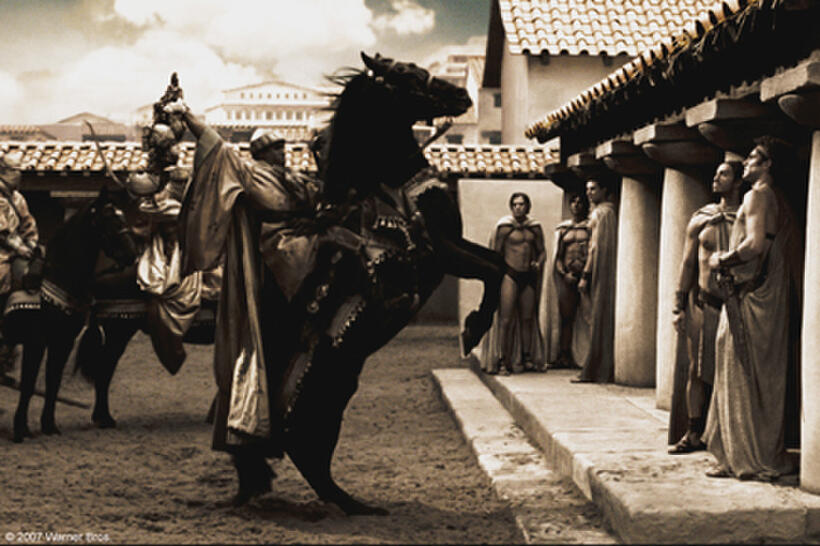 The Messenger (Peter Mensah) arrives in Sparta to deliver Xerxes’ message in "300."
