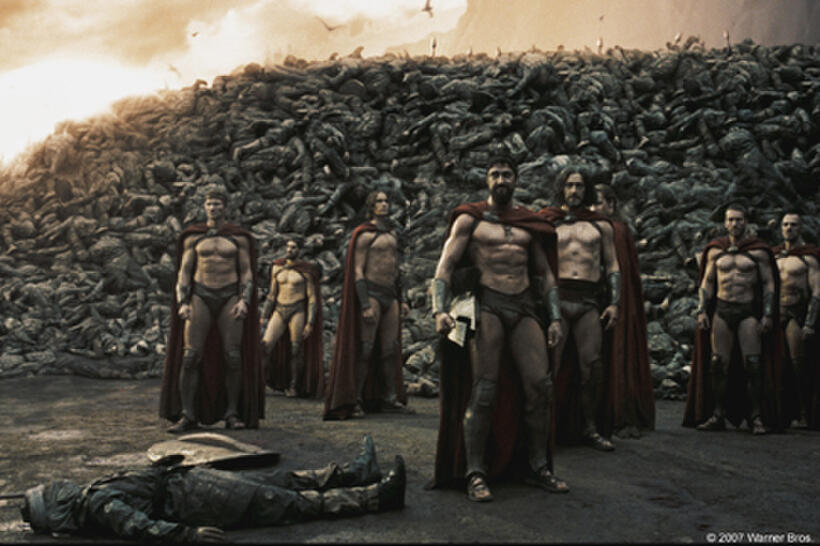 Astinos (Tom Wisdom), Leonidas (Gerard Butler) and his Captain (Vincent Regan) look toward the Persian encampment as a wall of the day’s dead rises behind them in "300."